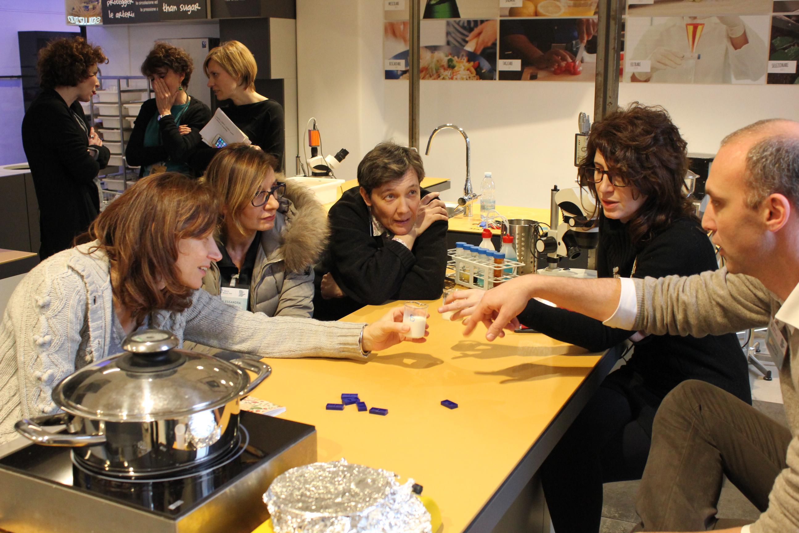 Teachers&Mentors working together on biotech experiments