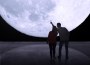 A couple by Museum of the Moon